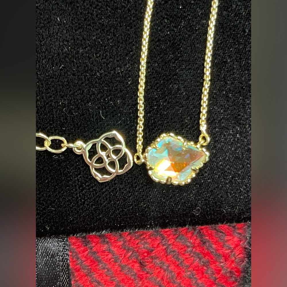 NWOT Kendra Scott gold and irridescent crystals necklace cue and earrings.